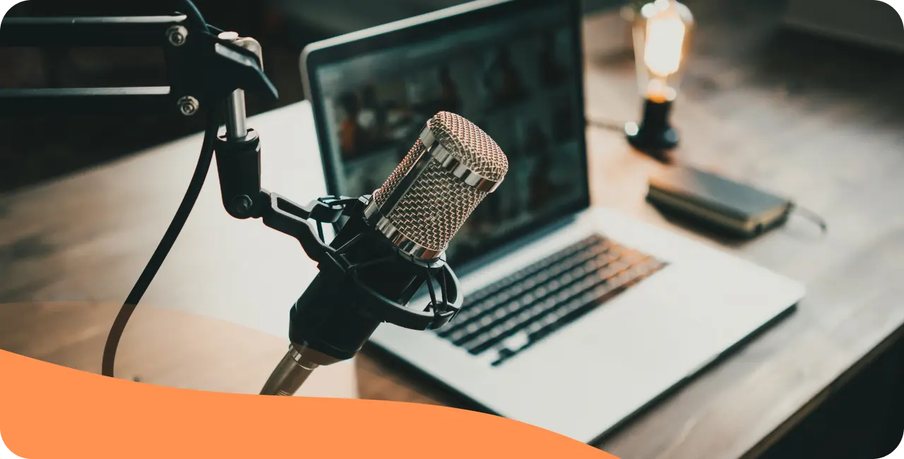 Simple radio station setup with microphone and computer